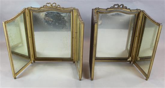 A pair of gold painted triptych dressing table mirrors 2ft 8in. x 4ft 7in.